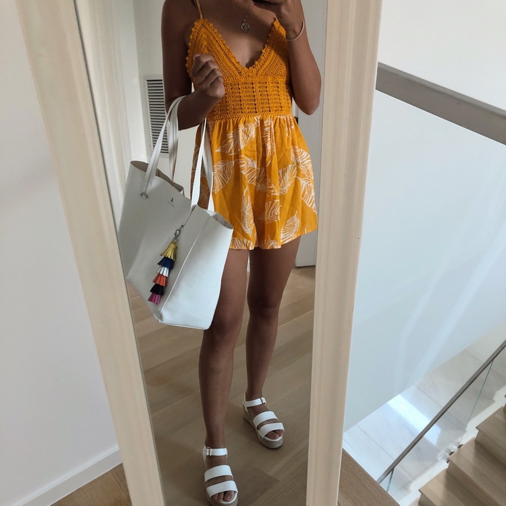 Yellow romper for beach. Size S. Open back. New